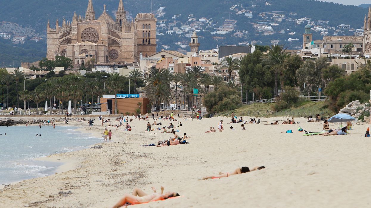 Swimmers on a beach in Palma