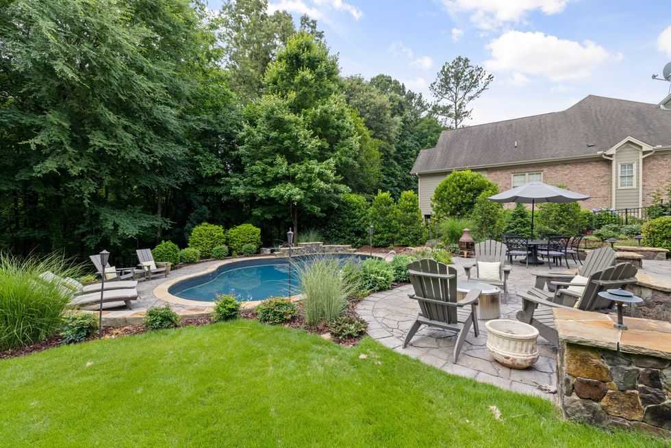 Swimming pool and decking in garden