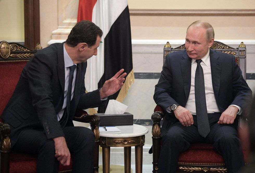 Syrian leader Bashar al-Assad and Vladimir Putin