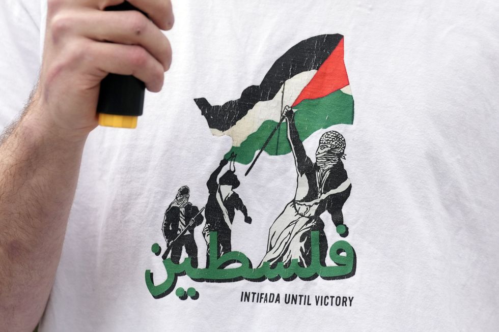 T-shirt with 'Intifada Until Victory' writing on it