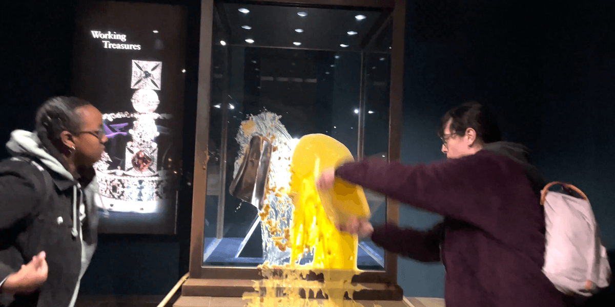 Protesters arrested after drenching Tower of London’s Crown Jewels display with food Protesters arrested after drenching Tower of London’s Crown Jewels display with food