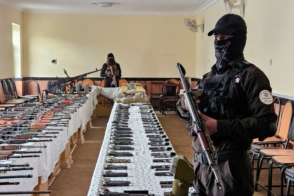 Taliban with captured arms