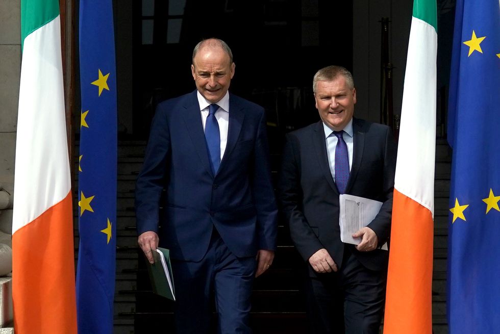 Taoiseach Micheal Martin and Michael McGrath (right), EU Commissioner for Democracy, Justice, the Rule of Law and Consumer Protection