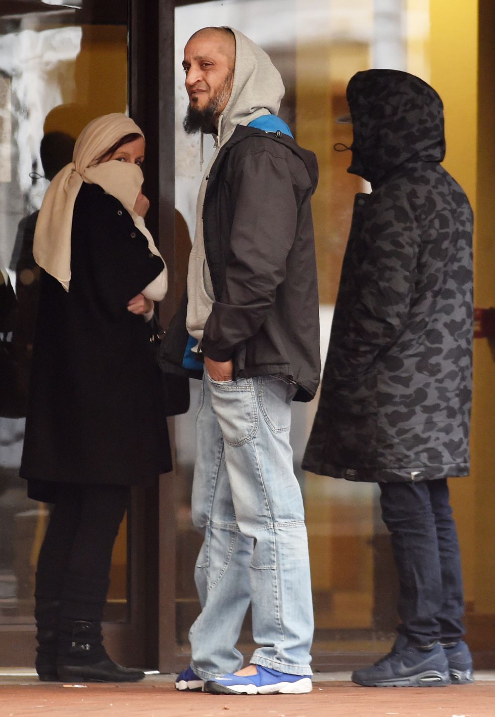 Tareena Shakil's mother Mandy, uncle and brother outside Birmingham Crown Court where Tareena, is charged with encouraging acts of terrorism and being a member of ISIS in 2016