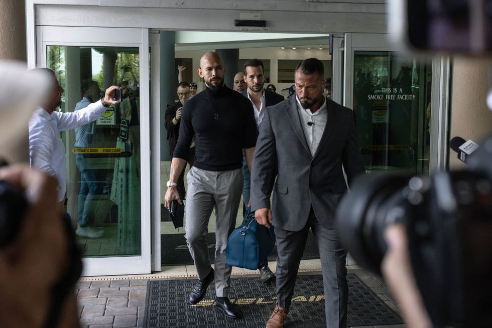 Tate brothers arrive in Miami