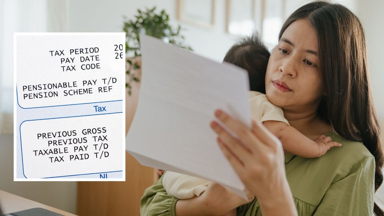 Tax code on payslip and person looks at letter