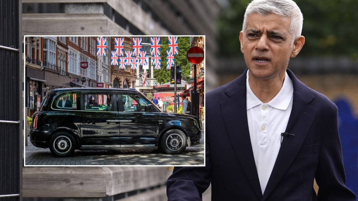 Taxi parked in London and London Mayor Sir Sadiq Khan
