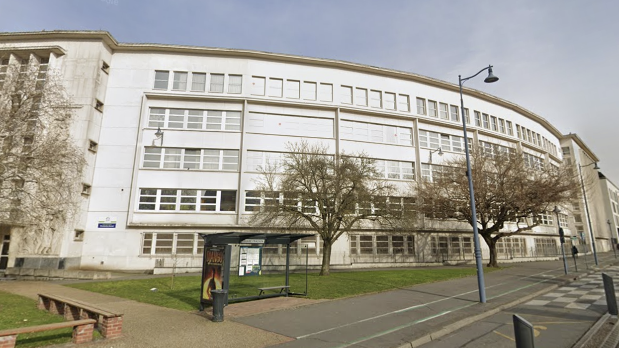 Teacher stabbed to death and two more injured in school knife attack