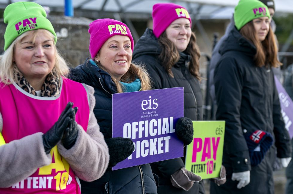 Teachers on the picket line outside Pinkie St Peters Primary School in Musselburgh, East Lothian, in a protest over pay. Members of the Educational Institute of Scotland (EIS) have walked out in the first national strike over pay for almost 40 years, with the action by teachers expected to close the majority of schools across Scotland. Picture date: Monday January 16, 2023.