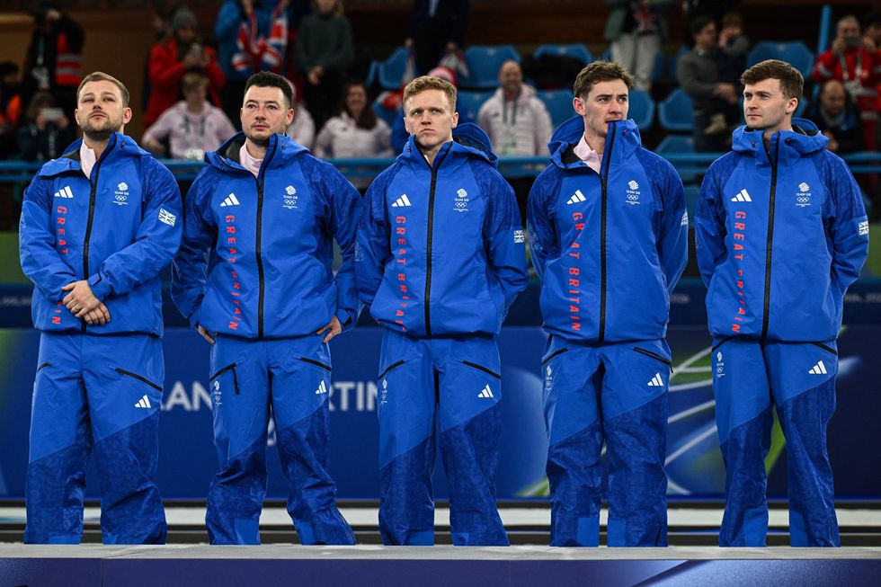 Team GB were overcome with emotion as they awaited their silver medals on the podium