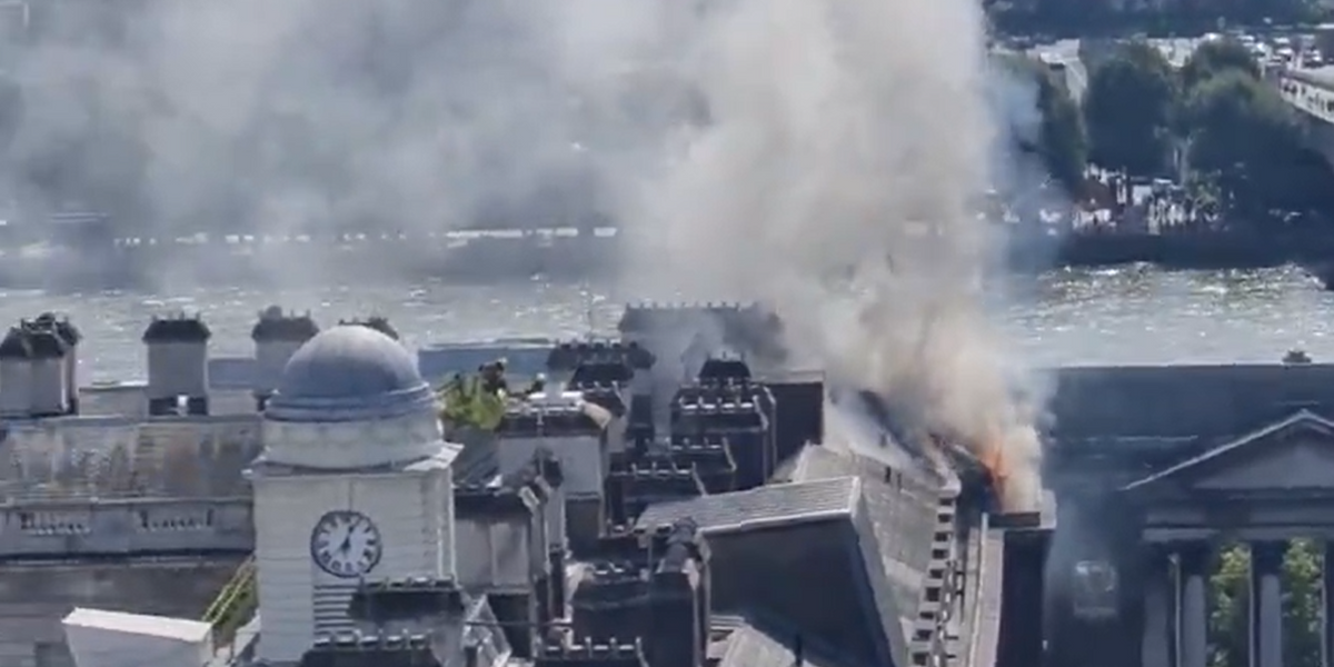 NextImg:Dozens of firefighters rush to Somerset House as thick black smoke seen for miles over London