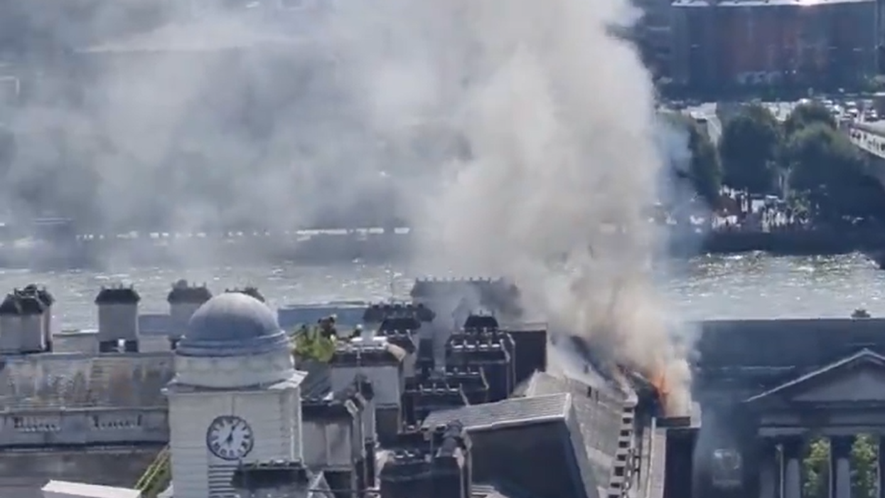 Ten fire engines rush to Somerset House as thick black smoke seen for miles over London