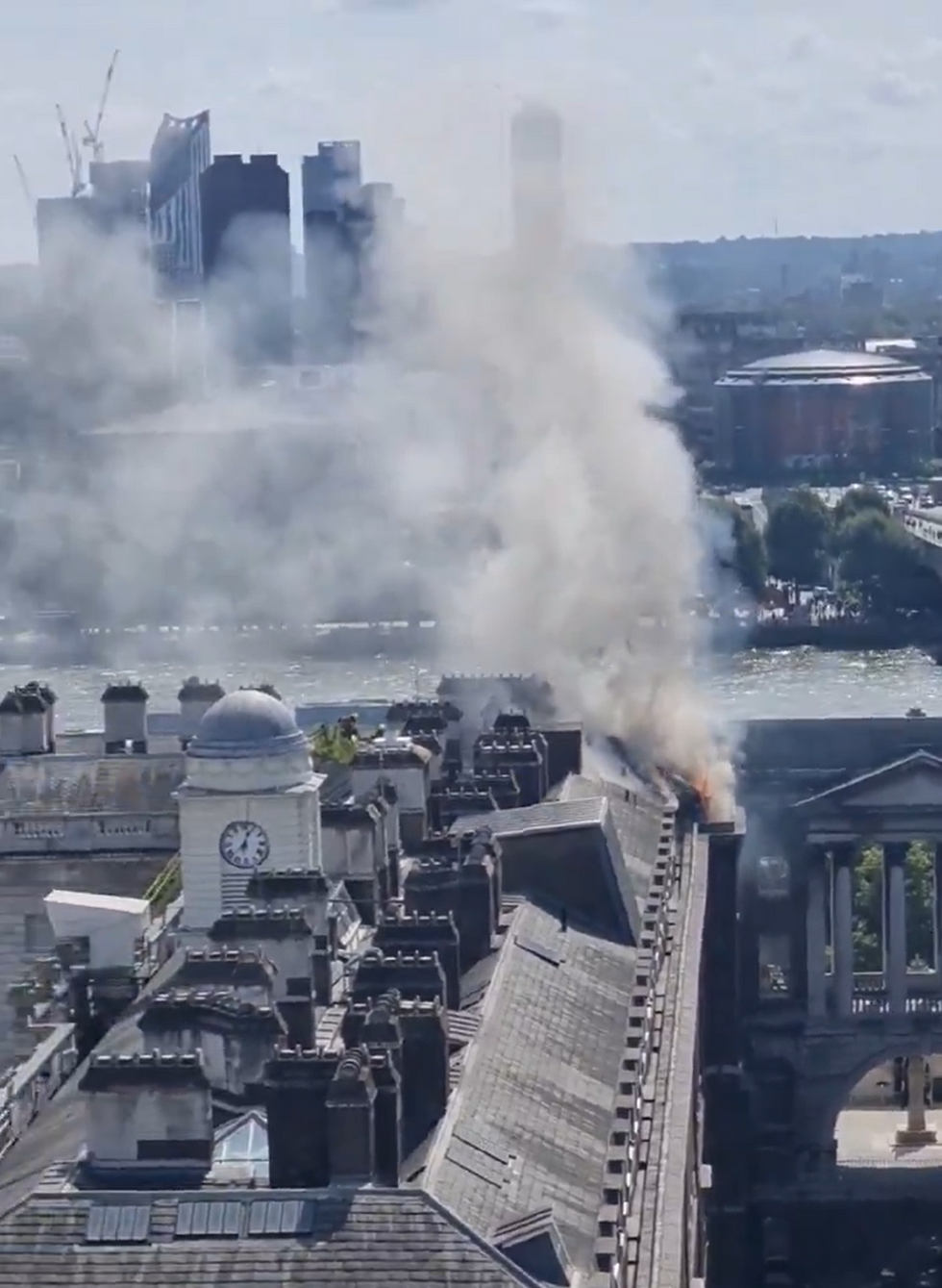 Ten fire engines rush to Somerset House as thick black smoke seen for miles over London