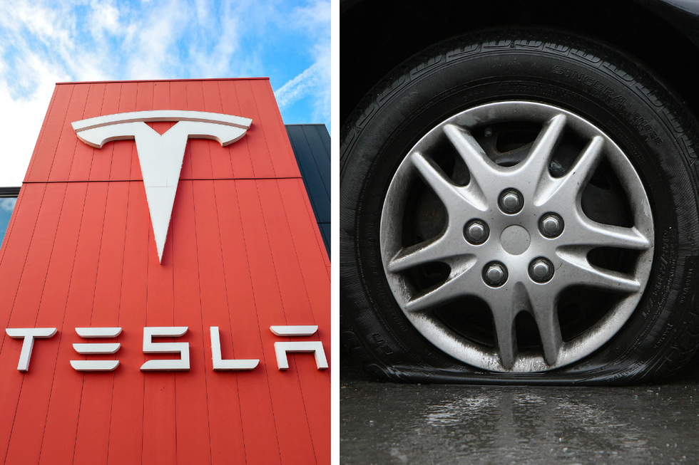 Tesla and a flat tyre (stock image)