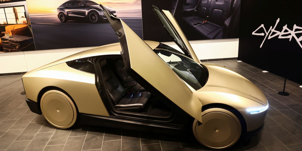 NextImg:Tesla Cybercab robotaxi finally arrives in the UK as Elon Musk praises car without steering wheel and pedals