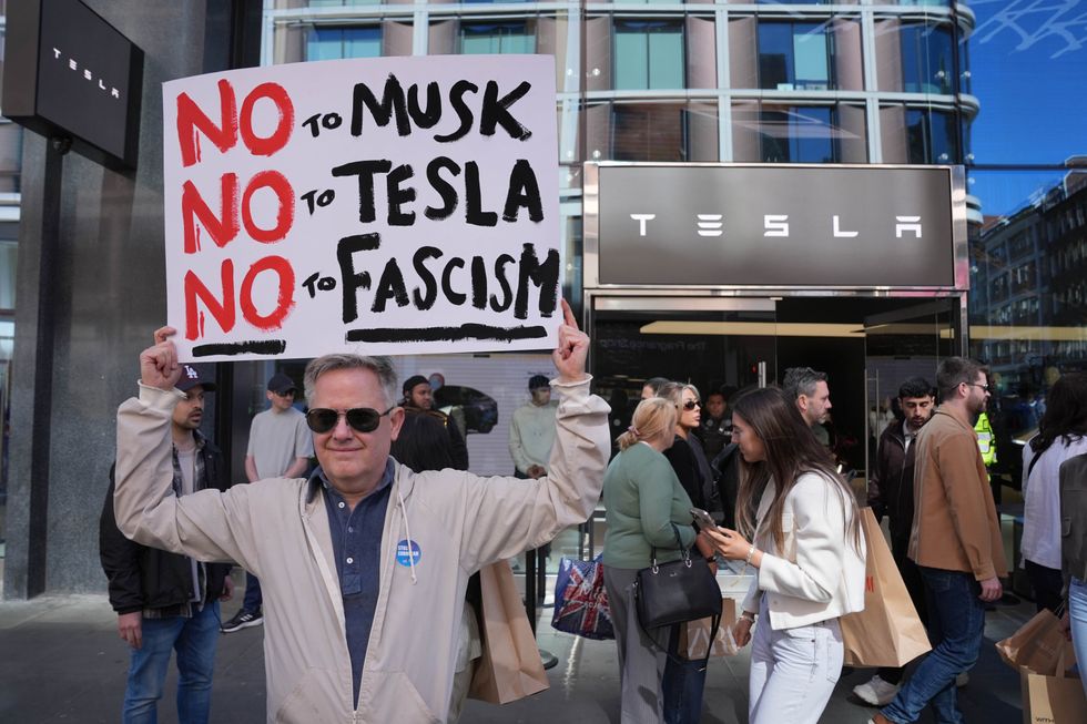 Tesla protest outside the Oxford Street popup shop