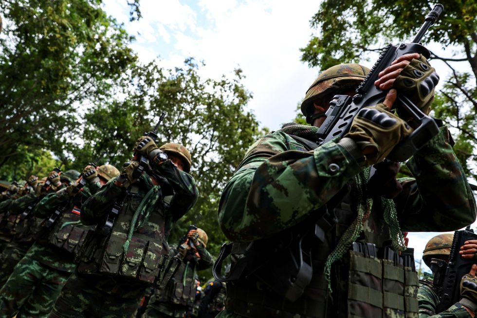 Thai troops on display near the border in June