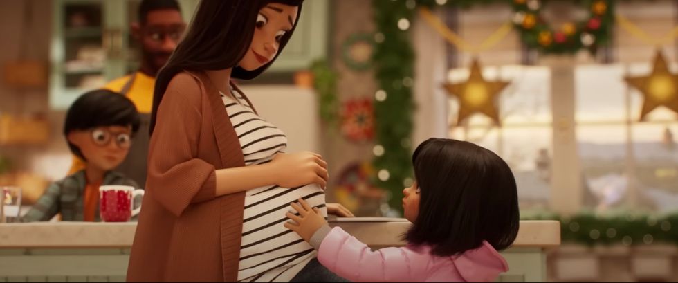 The advert tells the emotional tale of a family welcoming a new addition.