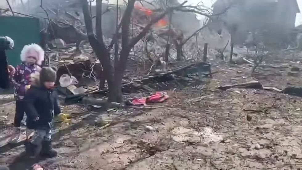 The aftermath of Russian artillery shelling on a residential area in Mariupol