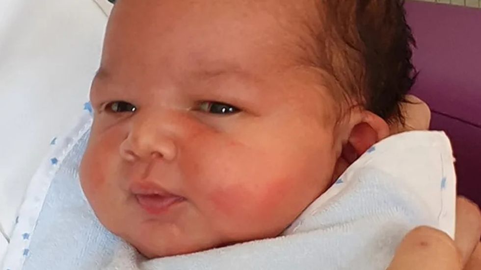 The baby was named George by hospital staff.