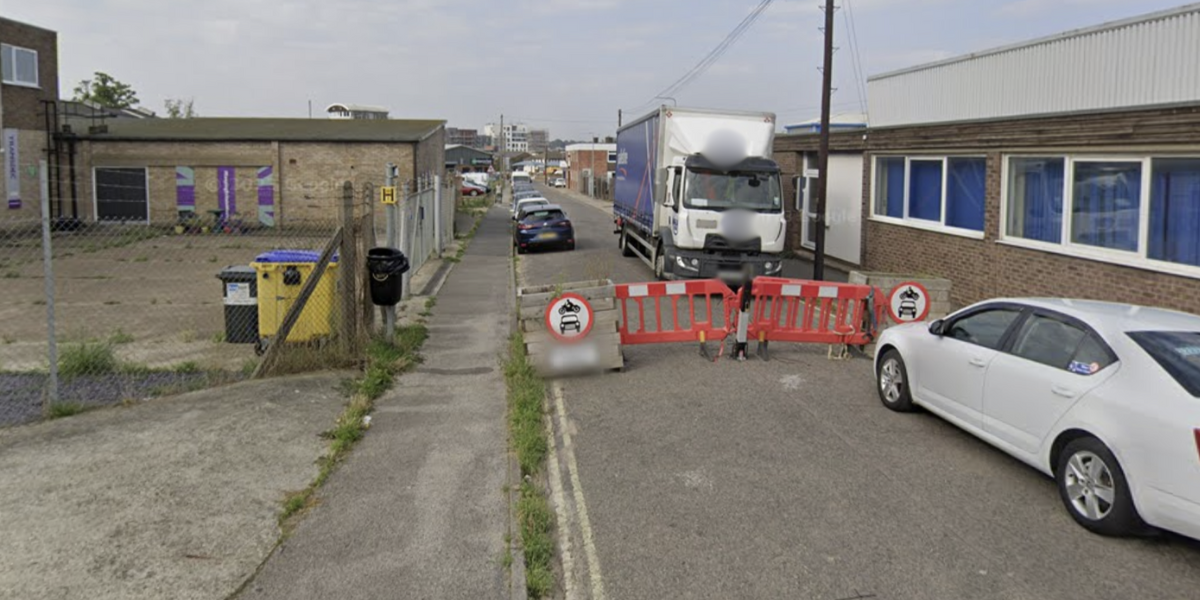 NextImg:Fuming locals set up barricade to stop 'selfish drivers treating street like rat run'