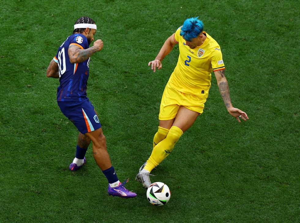 The BBC pundits were discussing Andrei Ratiu's bright blue hair