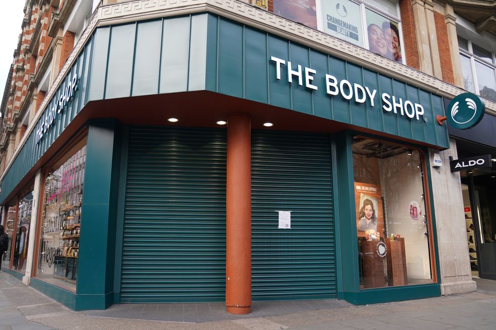 The Body Shop store with shutters down after store was closed in administration process