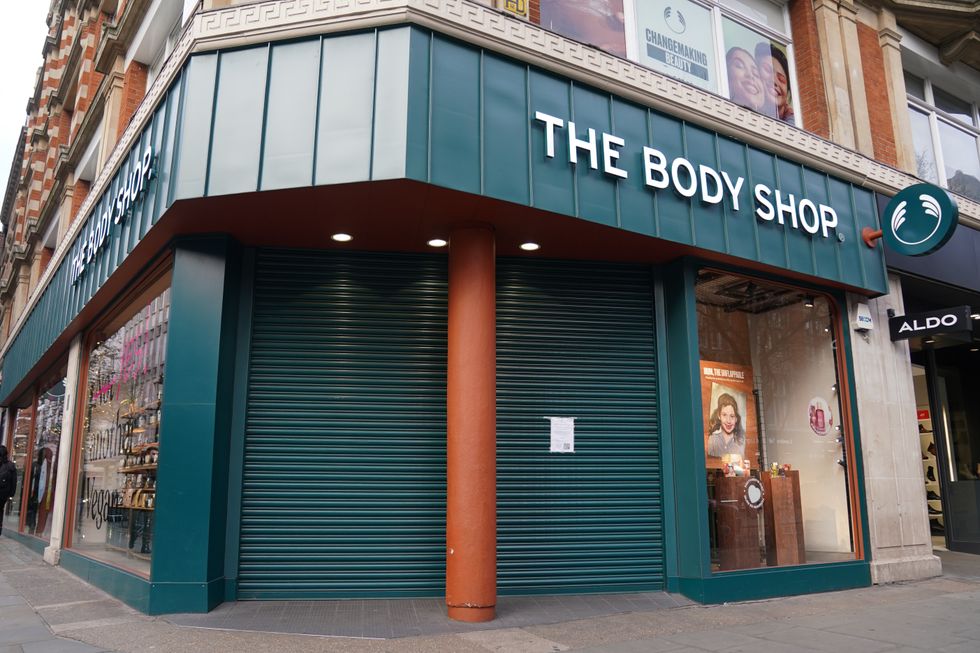 The Body Shop store with shutters down after store was closed in administration process