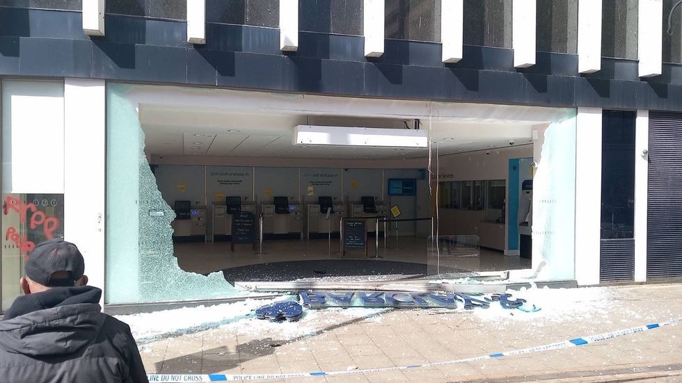 The branch, located in Croydon, was vandalised before its glass windows were shattered