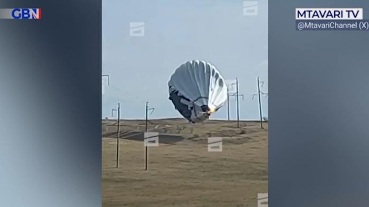 Three dead after British-made hot air balloon blown up following crash into high-voltage power lines