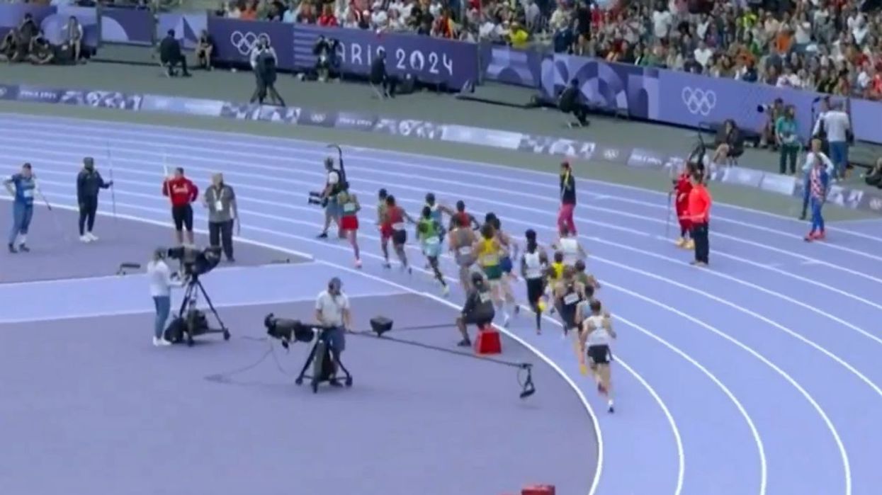 The cameraman was oblivious to the ongoing race