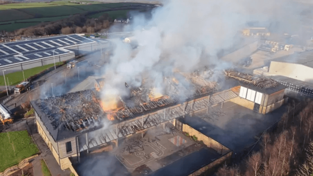 School ‘severely damaged’ in massive blaze as 15 fire engines rush to scene