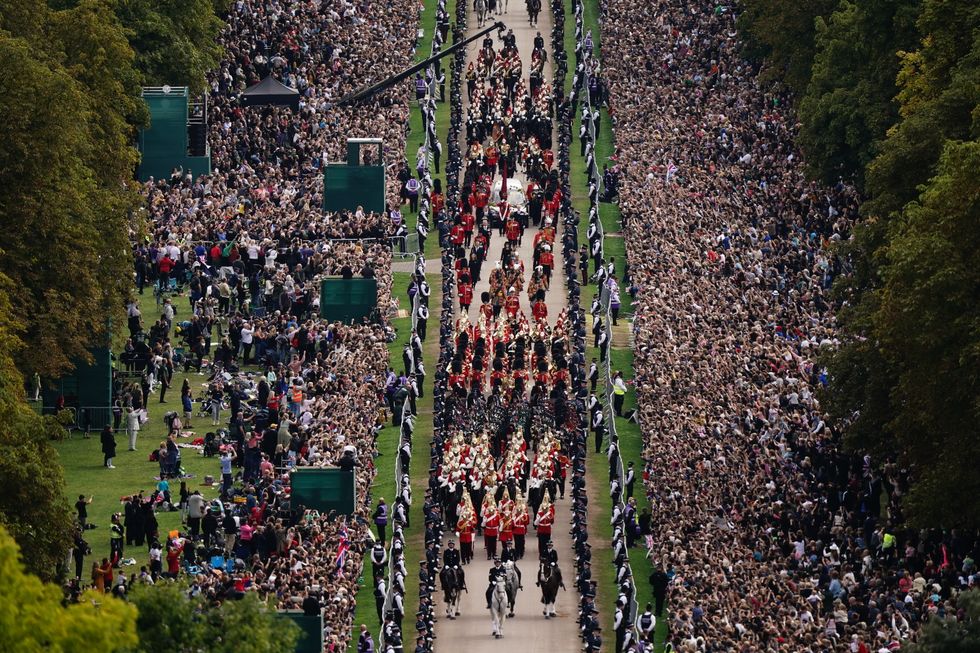 The Ceremonial Procession of the coffin of Queen Elizabeth II travels down the Long Walk as it arrives at Windsor Castle for the Committal Service at St George's Chapel. Picture date: Monday September 19, 2022.