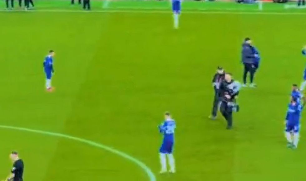 The Chelsea players appeared to ignore the young boy