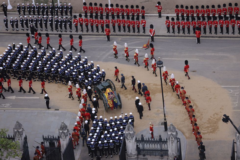 The coffin is moved to Westminster Abbey on the day of the state funeral and burial of Britain's Queen Elizabeth, in London, Britain, September 19, 2022. Rupert Frere/Pool via REUTERS