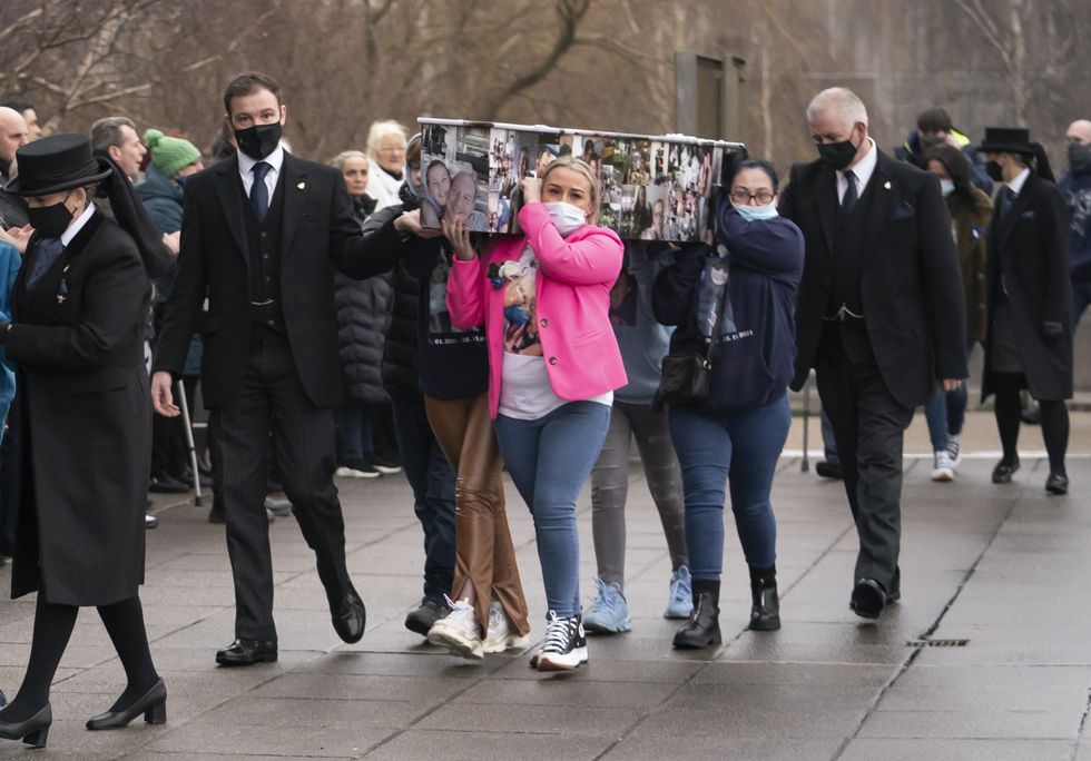 The coffin of Ava White is carried into Liverpool Metropolitan Cathedral for her funeral in December