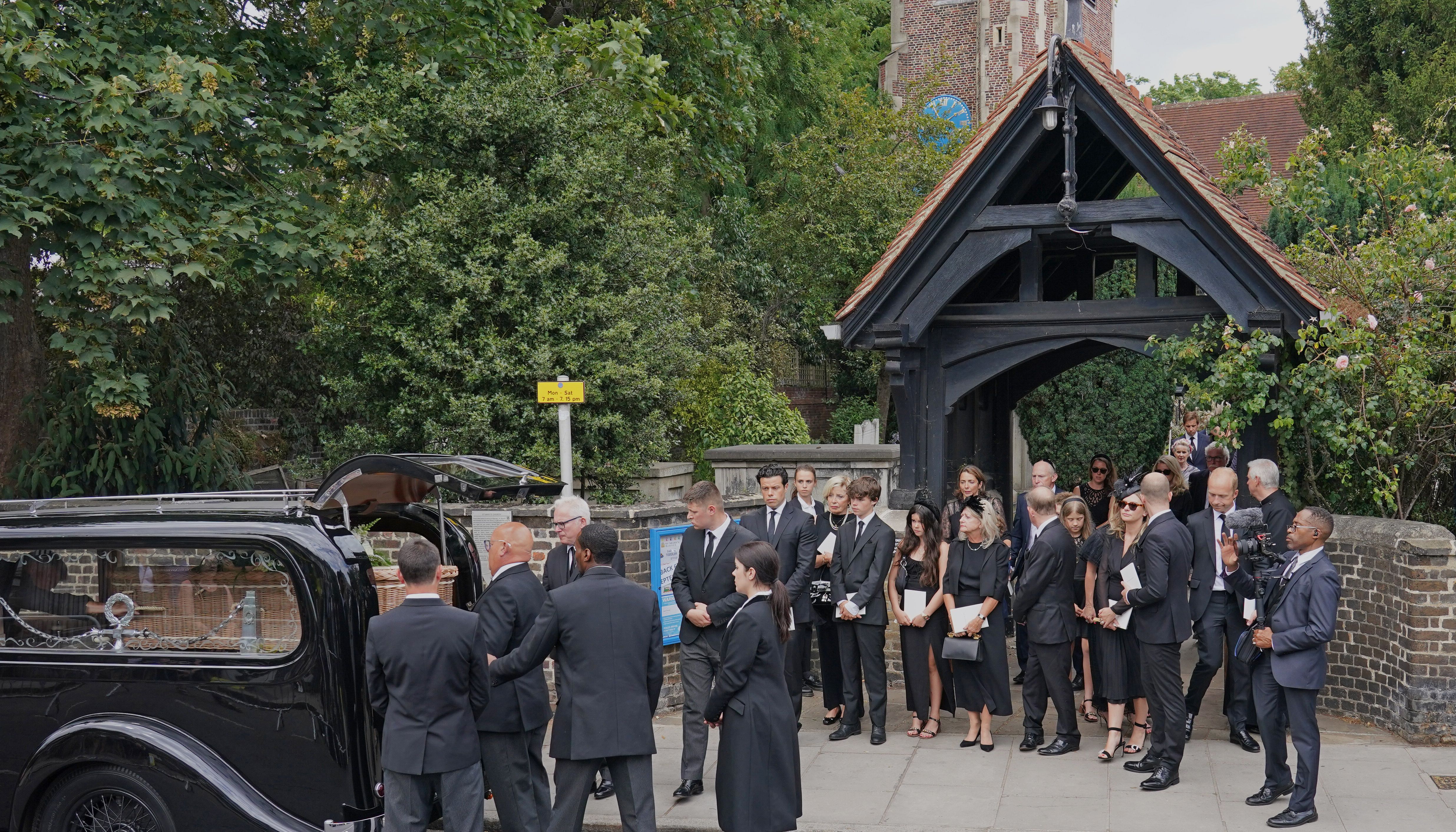 The coffin of Dame Deborah James is carried out following her funeral service at St Mary's Church in Barnes, west London. Picture date: Wednesday July 20, 2022.