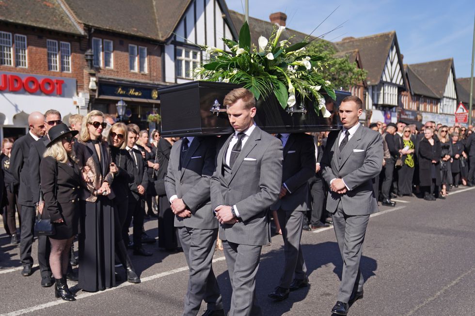 The coffin of The Wanted star Tom Parker is carried ahead of his funeral in Queensway, Petts Wood, in south-east London, following his death at the age of 33 last month, 17 months after being diagnosed with an inoperable brain tumour. Picture date: Wednesday April 20, 2022.