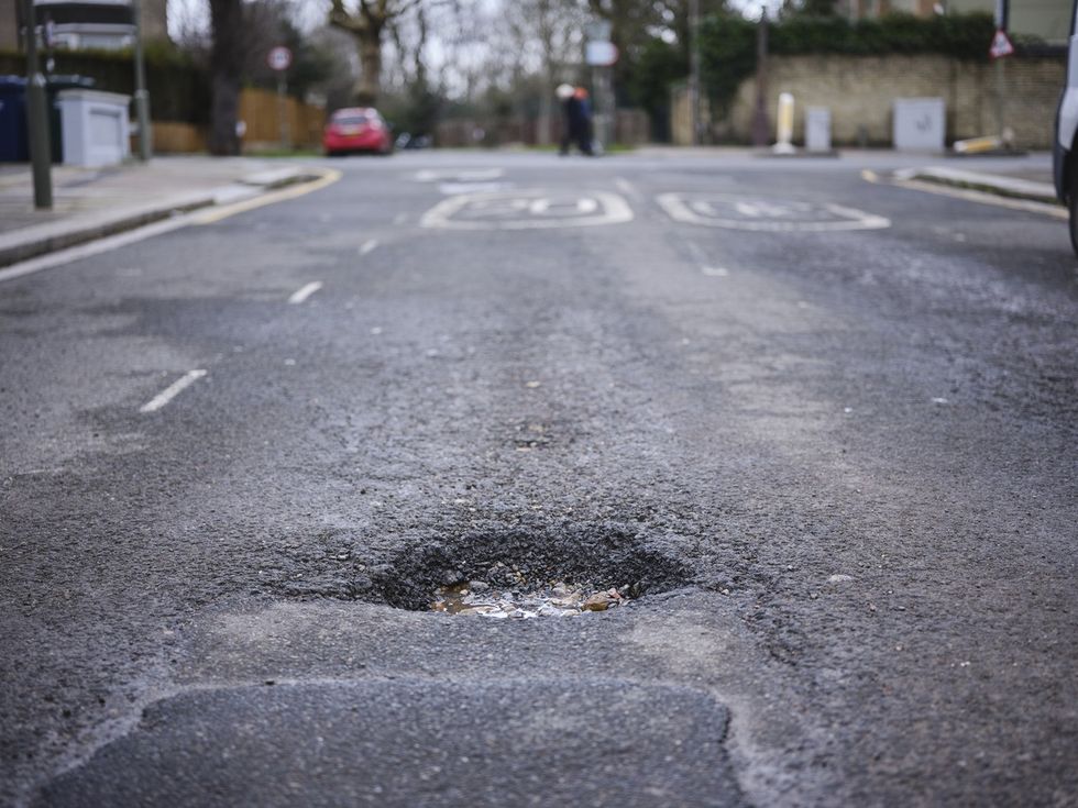 The council appeared to tell residents to fix the pothole themselves