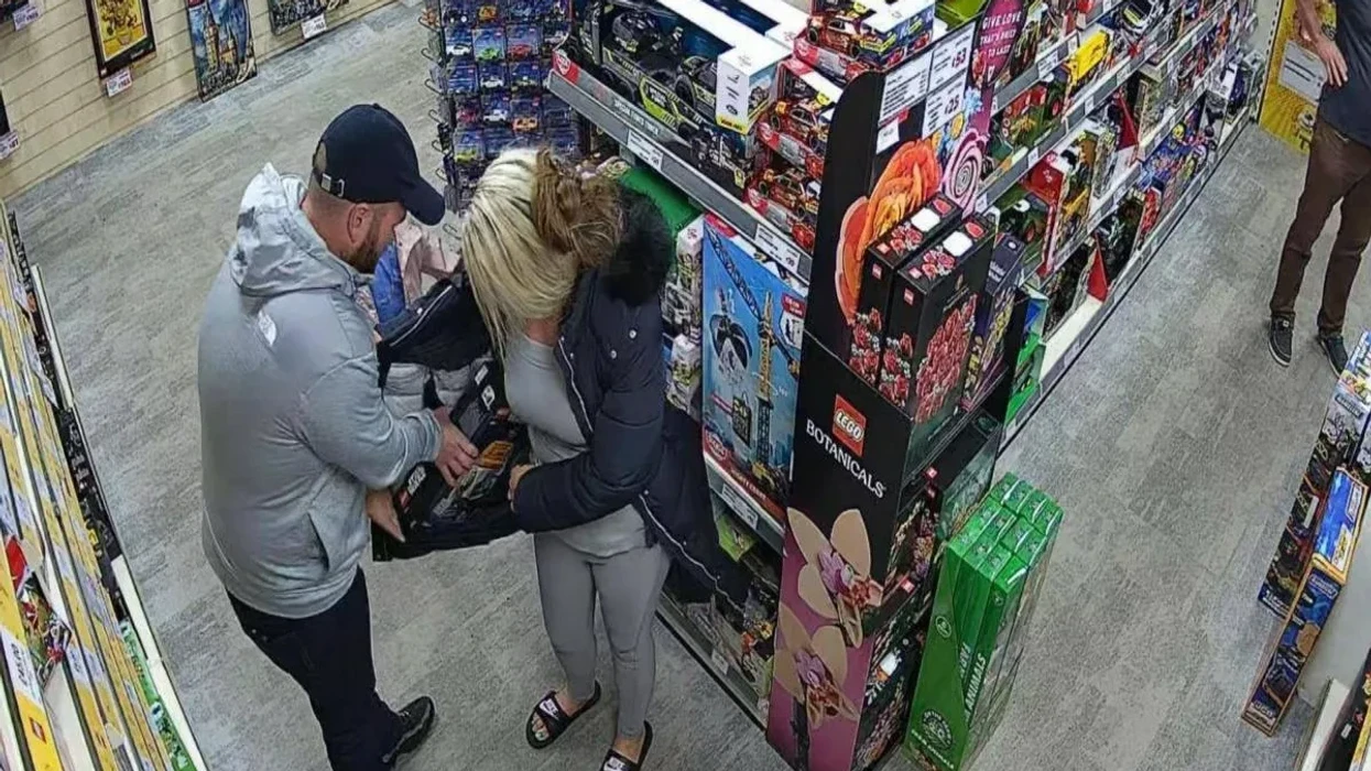 The couple were spotted on the store's CCTV