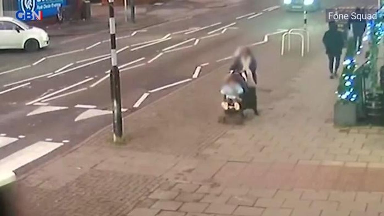 Mother and child cheat death as car rolls over after crashing into pedestrian crossing