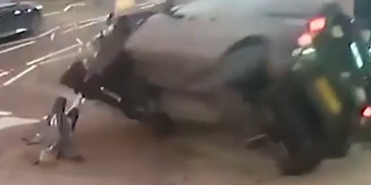 NextImg:Mother and child cheat death as car rolls over after crashing into pedestrian crossing
