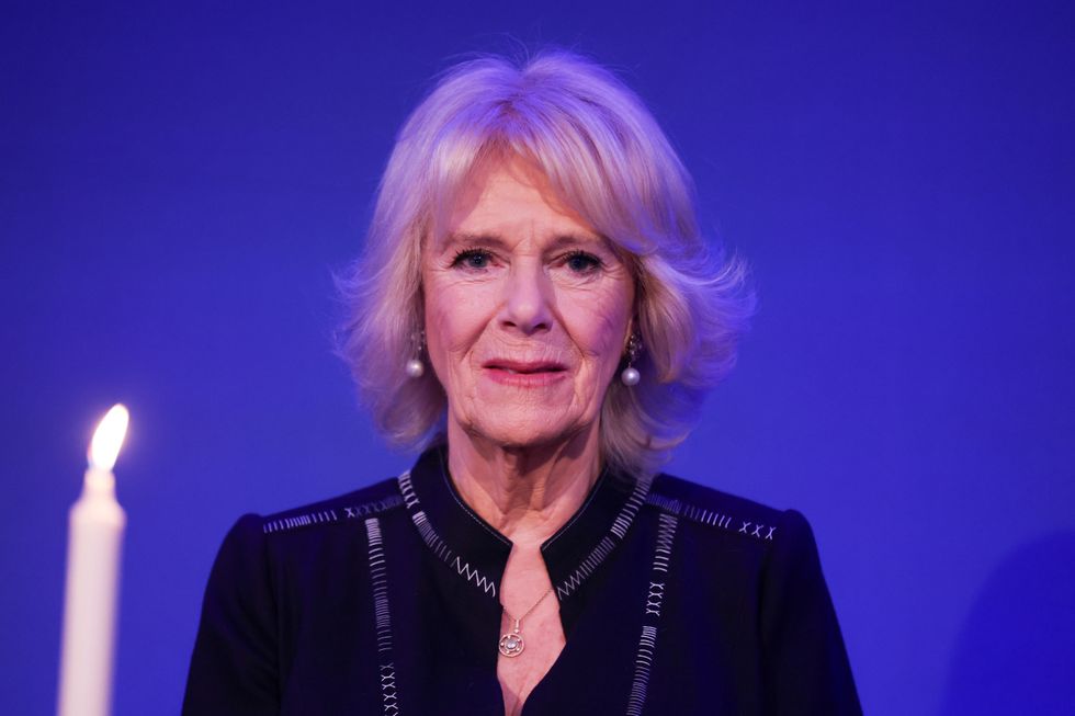 The Duchess of Cornwall takes part in a candle lighting ceremony during a reception for the Anne Frank Trust at the InterContinental London, Park Lane, London. Picture date: Thursday January 20, 2022.