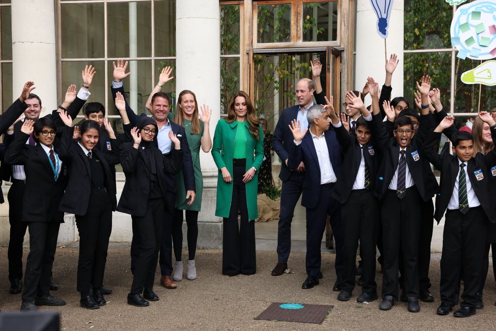 The Duke and Duchess of Cambridge alongside children from The Heathlands School with Mayor of London Sadiq Khan (right), TV presenter Steve Backshall MBE (2nd left) and Olympian Helen Glover (3rd left) during a visit to the Royal Botanic Gardens, Kew, in south London