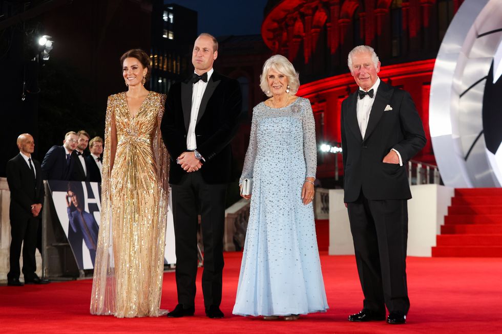 The Duke and Duchess of Cambridge (left) stand with the Prince of Wales and the Duchess of Cornwall, upon their arrival for the World Premiere of No Time To Die, at the Royal Albert Hall in London. Picture date: Tuesday September 28, 2021.