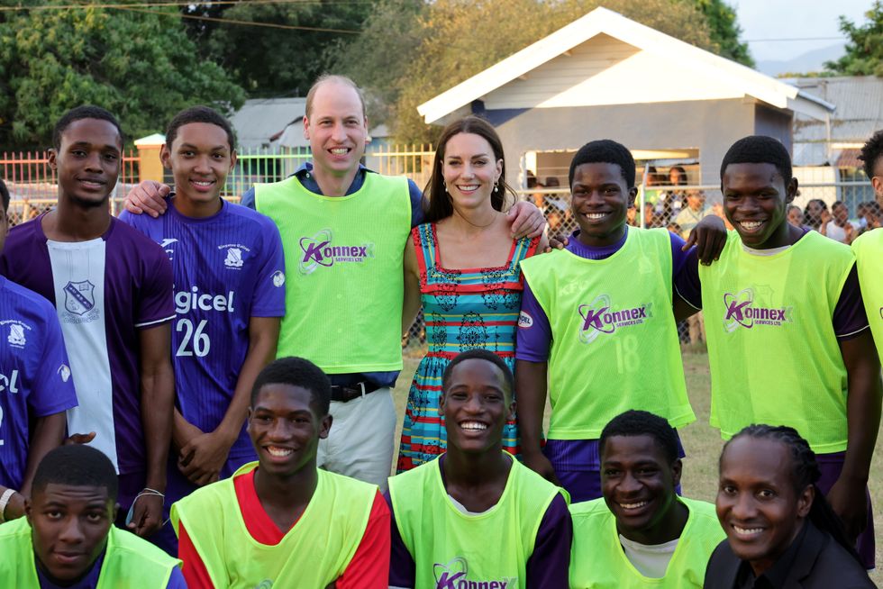 The Duke and Duchess of Cambridge meet winners of Jamaica's famous Manning Cup during a visit to Trench Town, the birthplace of reggae in Kingston, Jamaica, on day four of their tour of the Caribbean on behalf of the Queen to mark her Platinum Jubilee. Picture date: Tuesday March 22, 2022.