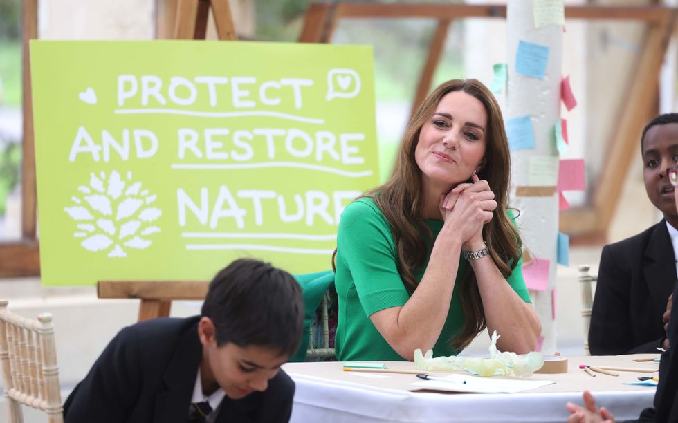 The Duke and Duchess of Cambridge with children from The Heathlands School during a visit to the Royal Botanic Gardens, Kew, in south London, to take part in a Generation Earthshot event.