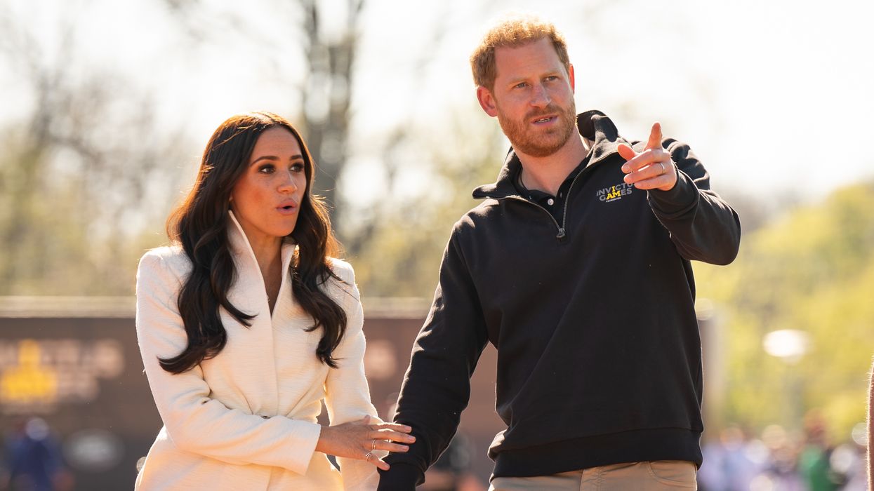 The Duke and Duchess of Sussex attending the Invictus Games athletics events in the Athletics Park, at Zuiderpark the Hague, Netherlands