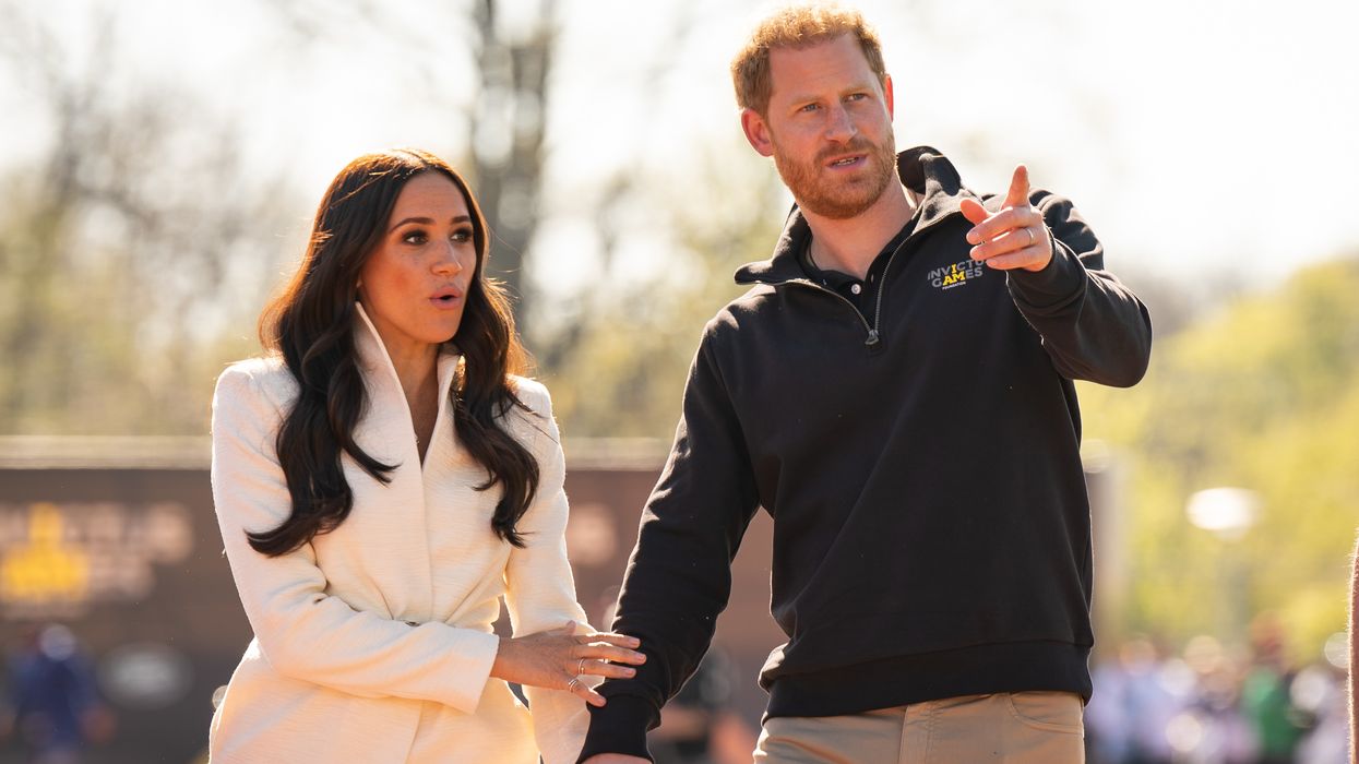 The Duke and Duchess of Sussex attending the Invictus Games athletics events in the Athletics Park, at Zuiderpark the Hague, Netherlands