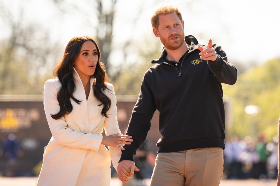 The Duke and Duchess of Sussex attending the Invictus Games athletics events in the Athletics Park, at Zuiderpark the Hague
